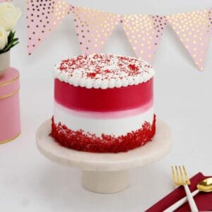 The Ultimate Valentine Cake, beautifully decorated with romantic accents, perfect for delivery anywhere in Lagos.