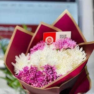 A charming bouquet of mixed chrysanthemum flowers in various vibrant colors, perfect for her.