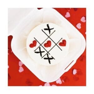 A charming XOXO Mini Bento Cake with romantic decorations, perfect for Valentine’s Day celebrations