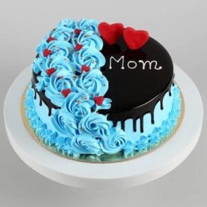 Heartfelt “Love You Mum” cake with elegant floral decorations, perfect for Mother’s Day and special celebrations.