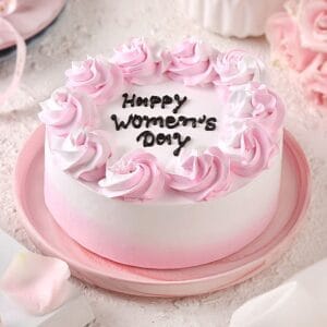 A collection of beautifully decorated Women’s Day Cakes, featuring rosette and piping designs and empowering messages, perfect for celebrating women.